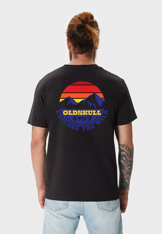 Oldskull T-Shirt 'Wrldvibe Explore The Wild' in Schwarz: Vorderseite