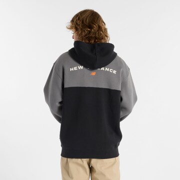 Veste de survêtement new balance en noir : devant