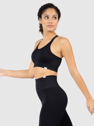 Smilodox Bralette Sports bra 'Amber' in Black