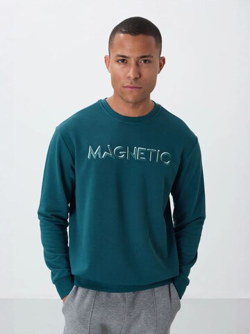 Sweat-shirt Tommy Life en bleu : devant