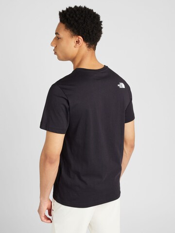 T-Shirt 'NEVER STOP EXPLORING' THE NORTH FACE en noir