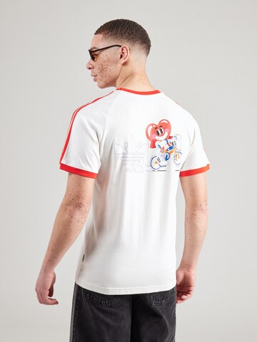 T-Shirt 'Q2 MBN Cali' ADIDAS ORIGINALS en blanc : devant