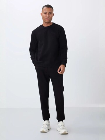 Tommy Life Joggingpak in Zwart