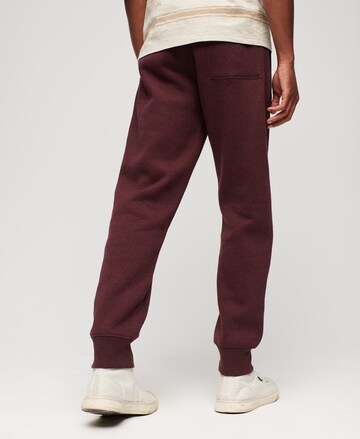 Effilé Pantalon 'Essential' Superdry en rouge