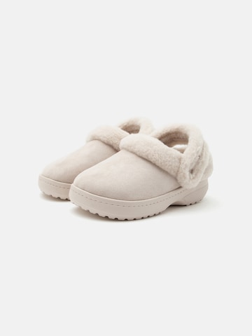 Crocs - Zuecos en beige