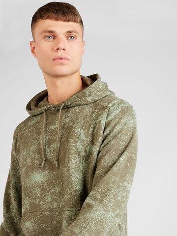 ADIDAS ORIGINALS Bluzka sportowa w kolorze zielony