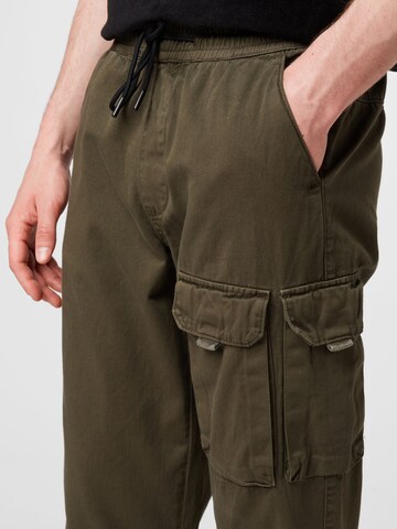 Effilé Pantalon cargo BURTON MENSWEAR LONDON en vert