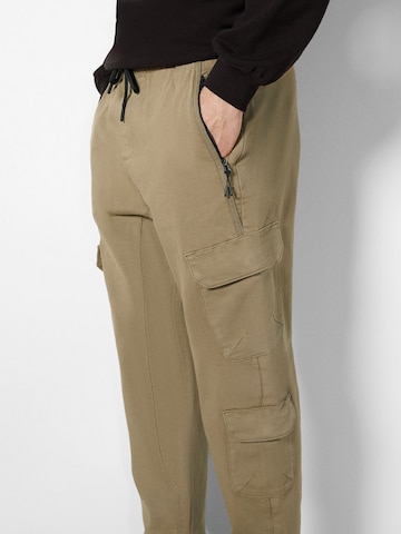 Bershka Tapered Hose in Beige