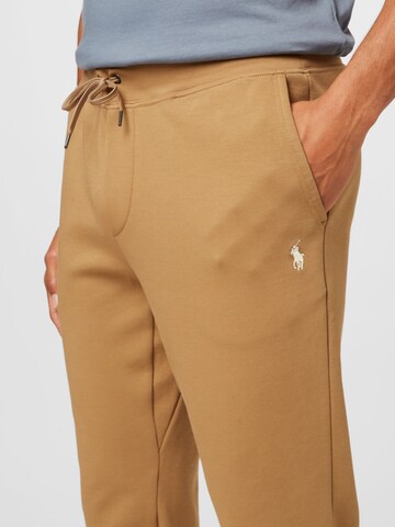 Polo Ralph Lauren Дънки Tapered Leg Панталон в бежово