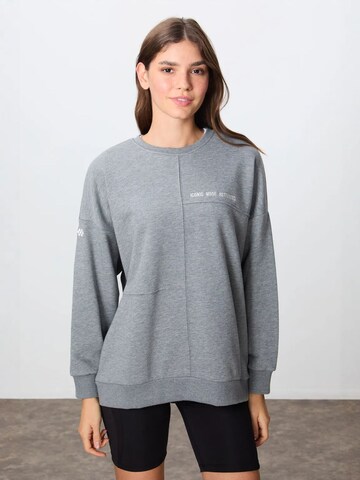 Sweat-shirt Tommy Life en gris