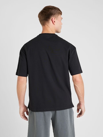 T-Shirt fonctionnel Reebok en noir