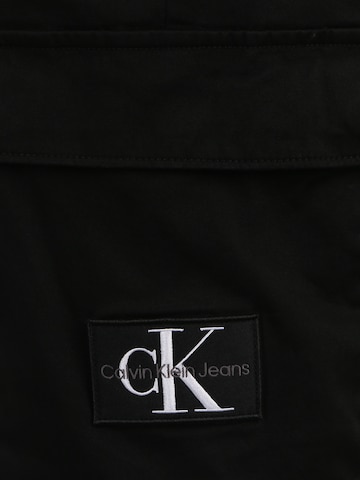 Calvin Klein Jeans Plus Tapered Cargohose in Schwarz