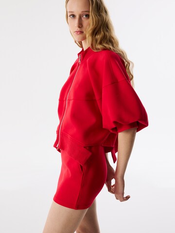 Veste de survêtement Twist en rouge