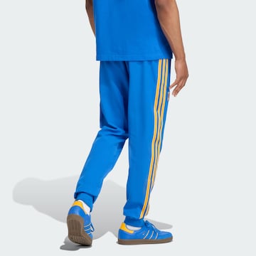 Effilé Pantalon de sport 'Tigres UANL Terrace Icons' ADIDAS ORIGINALS en bleu
