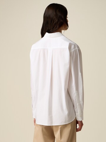 Camicia da donna di oltre in bianco