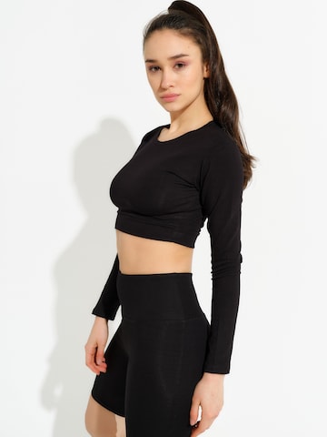 Evoni Funktionsshirt 'Bauchfrei'‌‌‌‌ in Schwarz