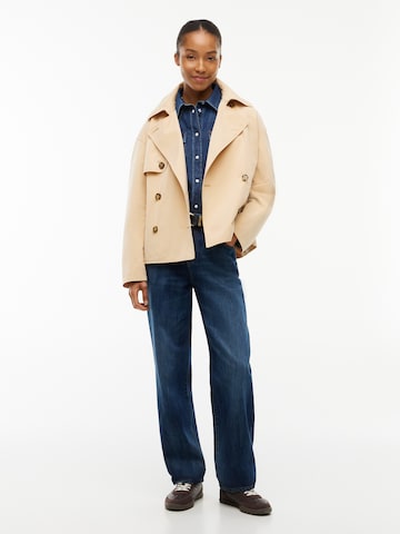 Tommy Jeans Välikausitakki värissä beige