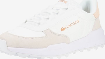 Baskets basses LACOSTE en blanc : devant