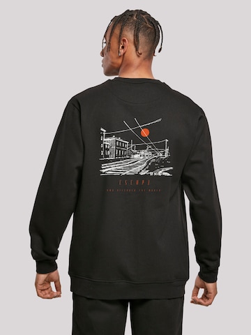 Sweat-shirt 'Escape Discover the World Town Train Station' F4NT4STIC en noir