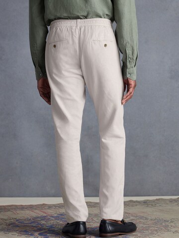 Slimfit Pantaloni chino di Next in grigio