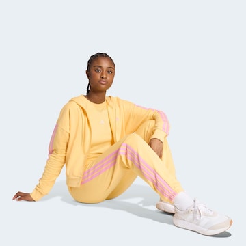 ADIDAS SPORTSWEAR Tapered Sporthose 'Essentials' in Gelb