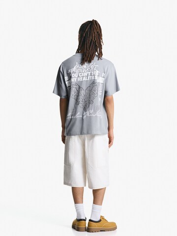 Maglietta di Bershka in grigio