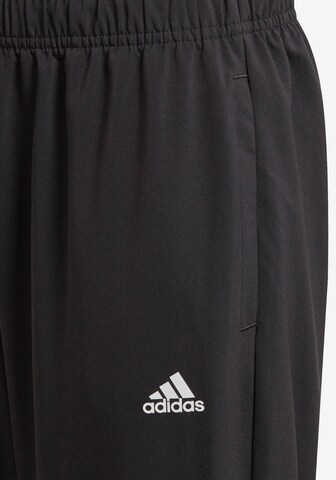 ADIDAS SPORTSWEAR Tapered Workout Pants 'Essentials Stanford' in Black