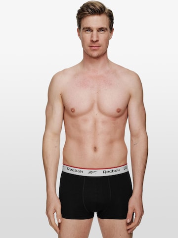 Reebok Športne spodnjice 'Ovett' | črna barva: sprednja stran