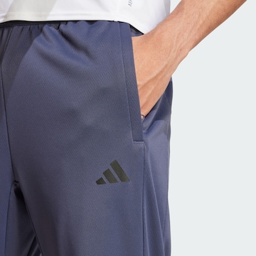 ADIDAS PERFORMANCE Zwężany krój Spodnie sportowe 'Essentials' w kolorze niebieski