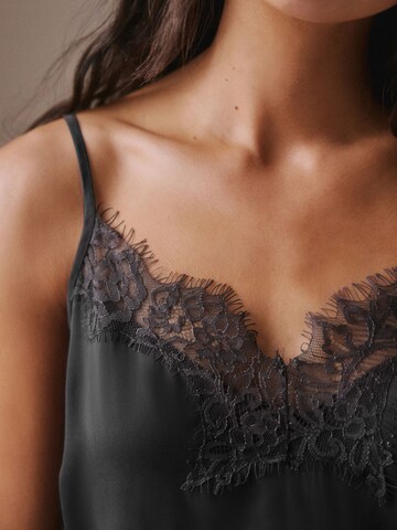 Next - Top en negro