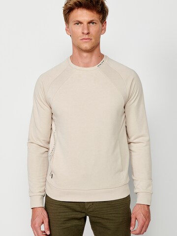 Felpa di KOROSHI in beige: frontale