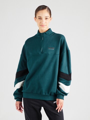 Hummel - Camiseta deportiva en verde: frente