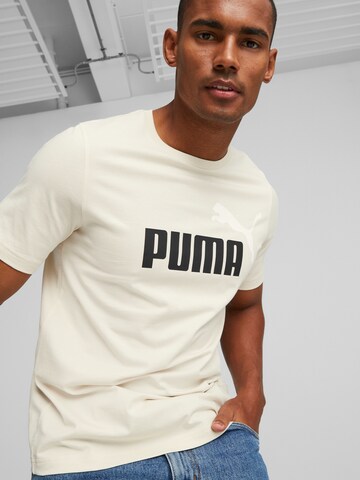 PUMA Λειτουργικό μπλουζάκι 'Essentials' σε λευκό: μπροστά