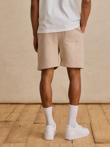 DAN FOX APPAREL Loosefit Shorts 'Sean' in Beige