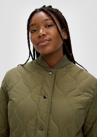 TRIANGLE Between-season jacket in Green