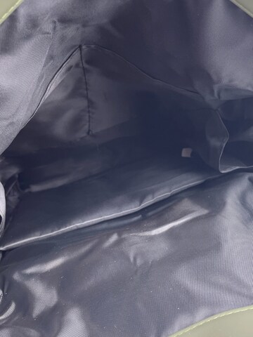 Kumixi Rucksack in Grün