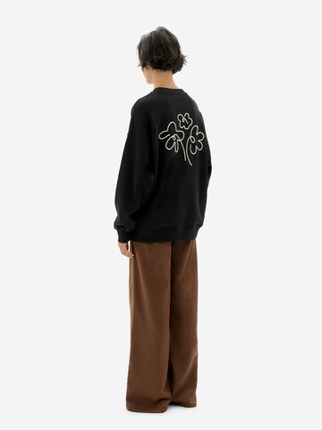 Thinking MU Μπλούζα φούτερ 'Flower Rope' σε μαύρο