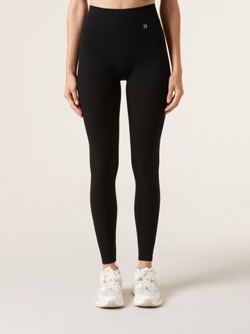 CALZEDONIA Skinny Athletic Pants in Black