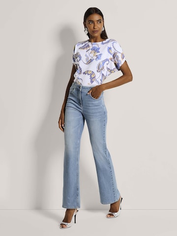 évasé Jean MADELEINE en bleu