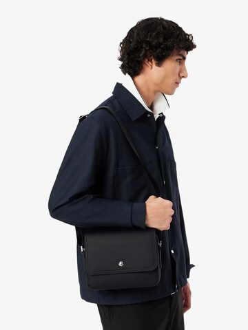 LACOSTE Taška přes rameno 'Lacoste Petit sac messenger Homme Langon Petit Piqué Noir' – černá