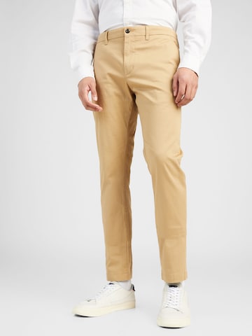 TOMMY HILFIGER Slimfit Chino nadrág 'Bleecker' - barna: elől