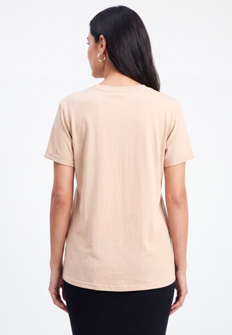 T-shirt usha BLACK LABEL en orange
