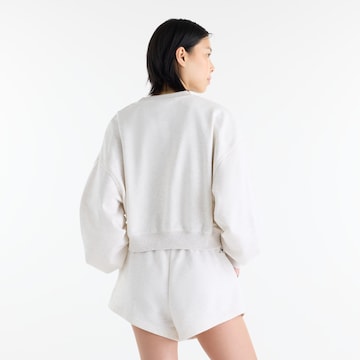 Loosefit Pantaloni 'Trackside' di new balance in beige