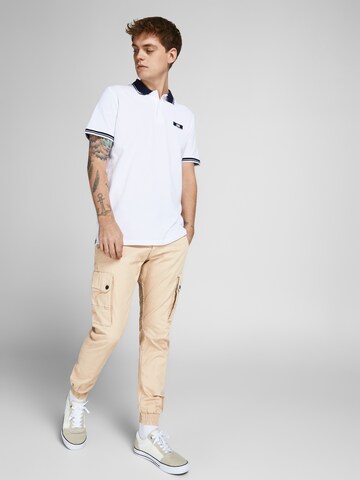 JACK & JONES Alt kitsenev Klapptaskutega püksid 'JWHPAUL JJWARNER', värv beež: eest vaates