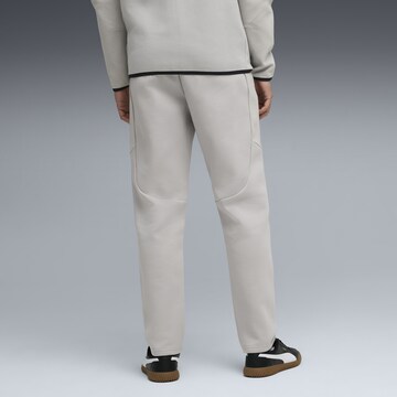 PUMA Regular Sporthose 'Evostripe' in Grau