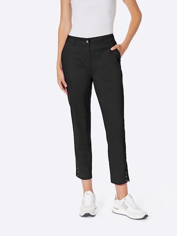 Regular Pantalon à plis heine en noir : devant