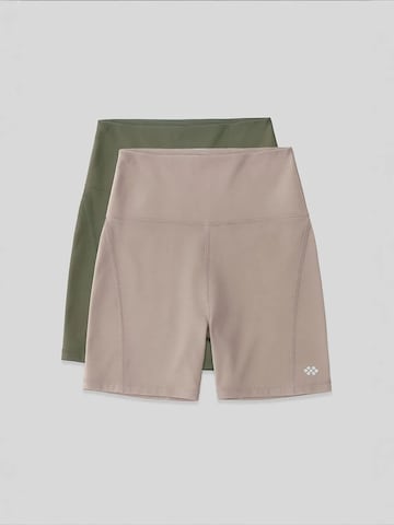 Tommy Life - Tapered Leggings 'Gamaschen' em verde: frente
