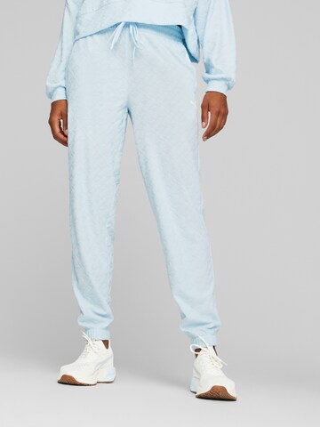 Effilé Pantalon de sport PUMA en bleu : devant