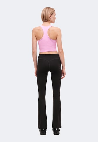 Evazați Pantaloni sport 'Luxe' de la ICANIWILL pe negru