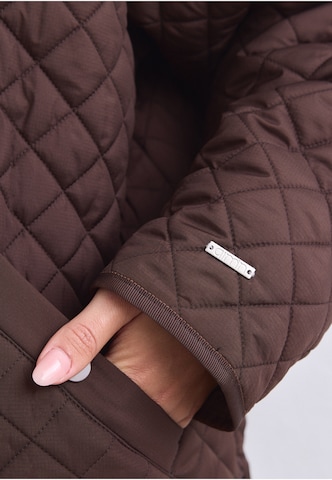 Veste de sport Aim'n en marron